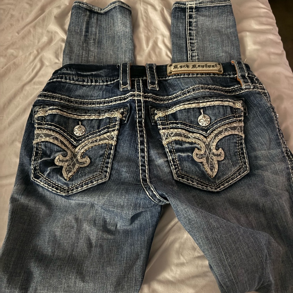 Rock Revival Blue Boot Cut Jeans with Embroidered DetailsRock revivail